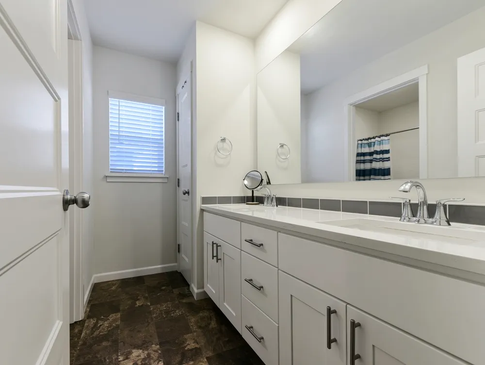 Bathroom remodel permit plans beside plumbing, electrical and tile installation work