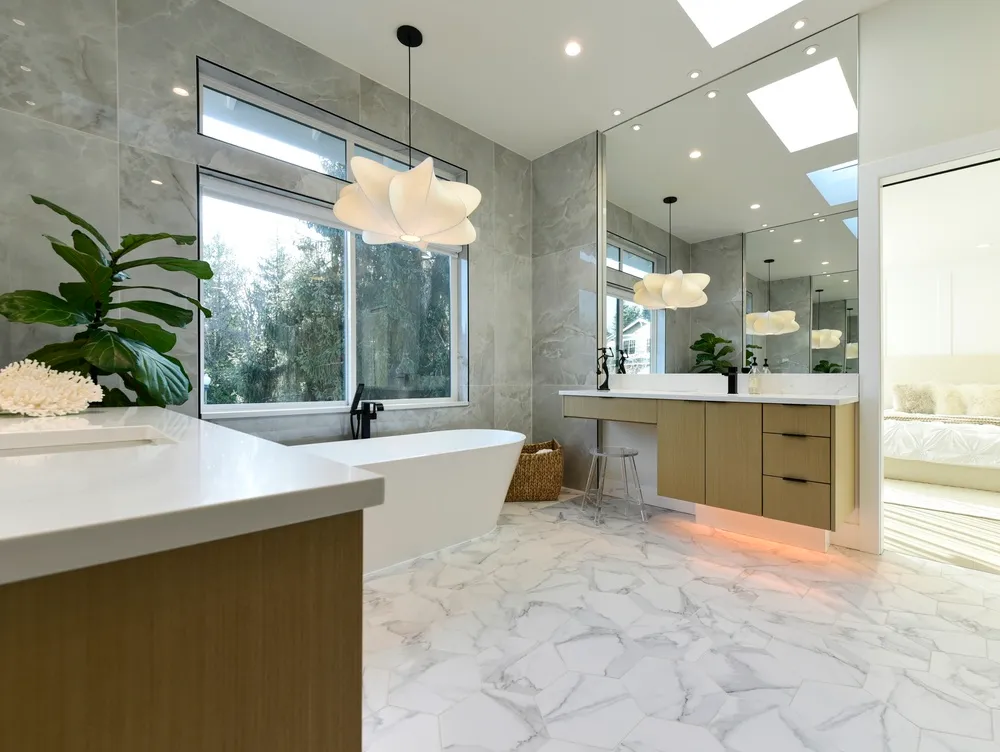 Bathroom remodel permit plans beside plumbing, electrical and tile installation work