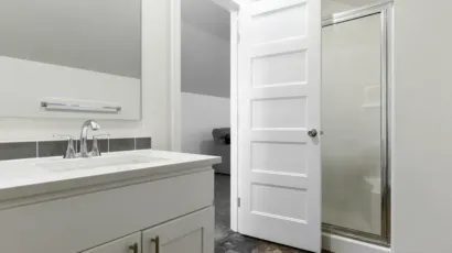 Bathroom remodel permit plans beside plumbing, electrical and tile installation work