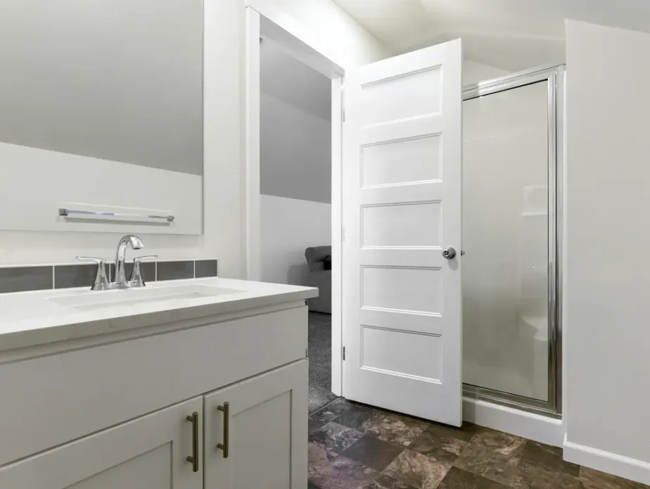 Bathroom remodel permit plans beside plumbing, electrical and tile installation work
