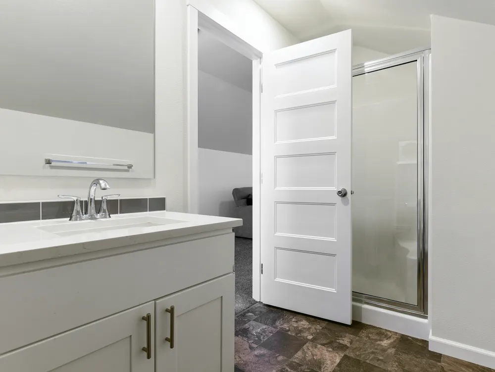 Bathroom remodel permit plans beside plumbing, electrical and tile installation work