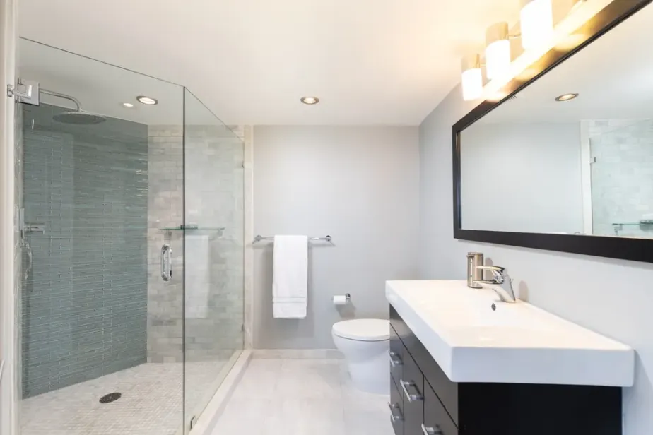 Bathroom remodel timeline showing demolition, rough-in, tile installation and final fixture work
