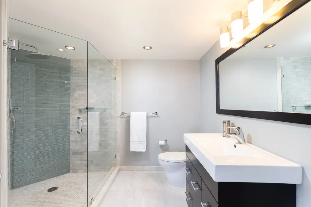 Bathroom remodel timeline showing demolition, rough-in, tile installation and final fixture work